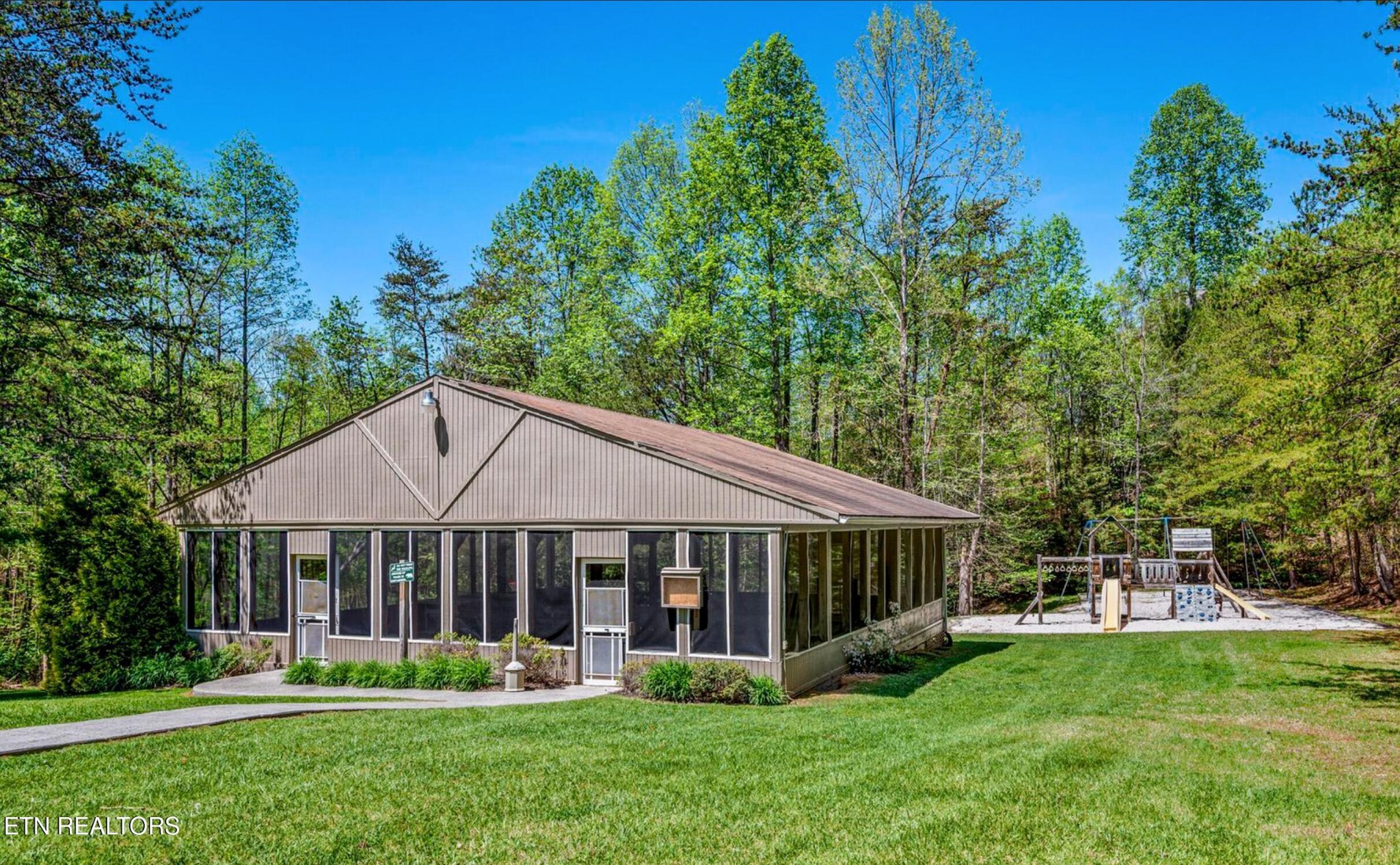 3710 Weber Road, Unit C301 Gatlinburg, TN 37738 - Photo 42 of 44 a view of a house with a yard
