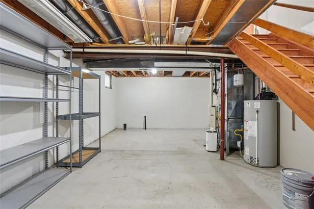a view of a room with wooden walls