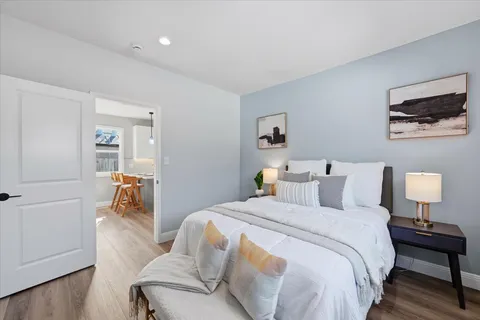 a room with two washing machine and a sink