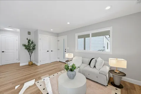 a view of living room filled with furniture