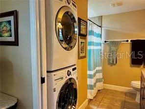 a view of a bathroom with a sink and a mirror