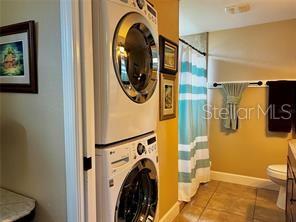 16909 Franklin Avenue, Unit B Montverde, FL 34756 - Photo 8 of 13 a view of a bathroom with a sink and a mirror