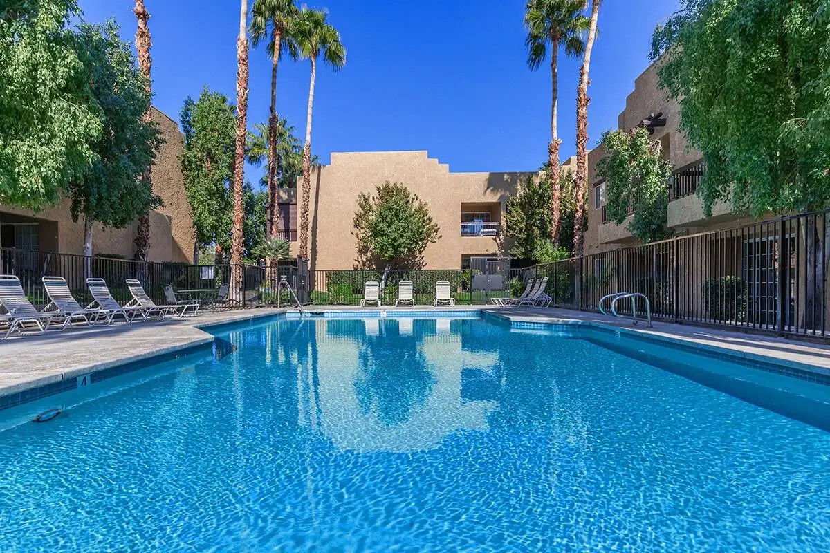 392 East Stevens Road Palm Springs, CA 92262 - Photo 2 of 10 a swimming pool with outdoor seating and yard