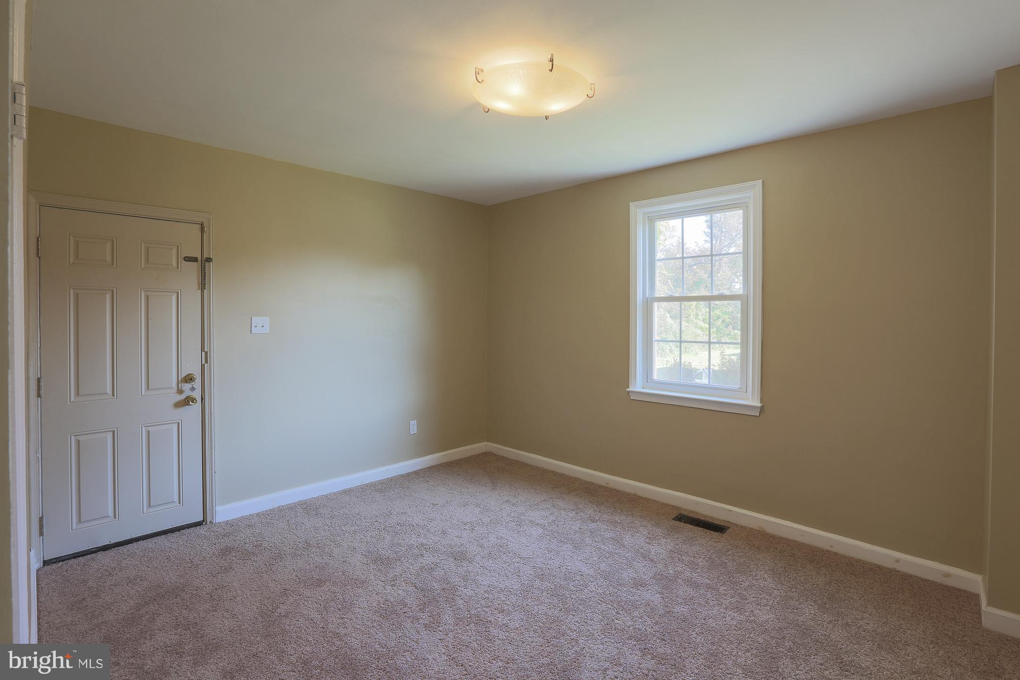 3212 Shelburne Road Baltimore, MD 21208 - Photo 11 of 25 Main Level Bedroom with access to deck