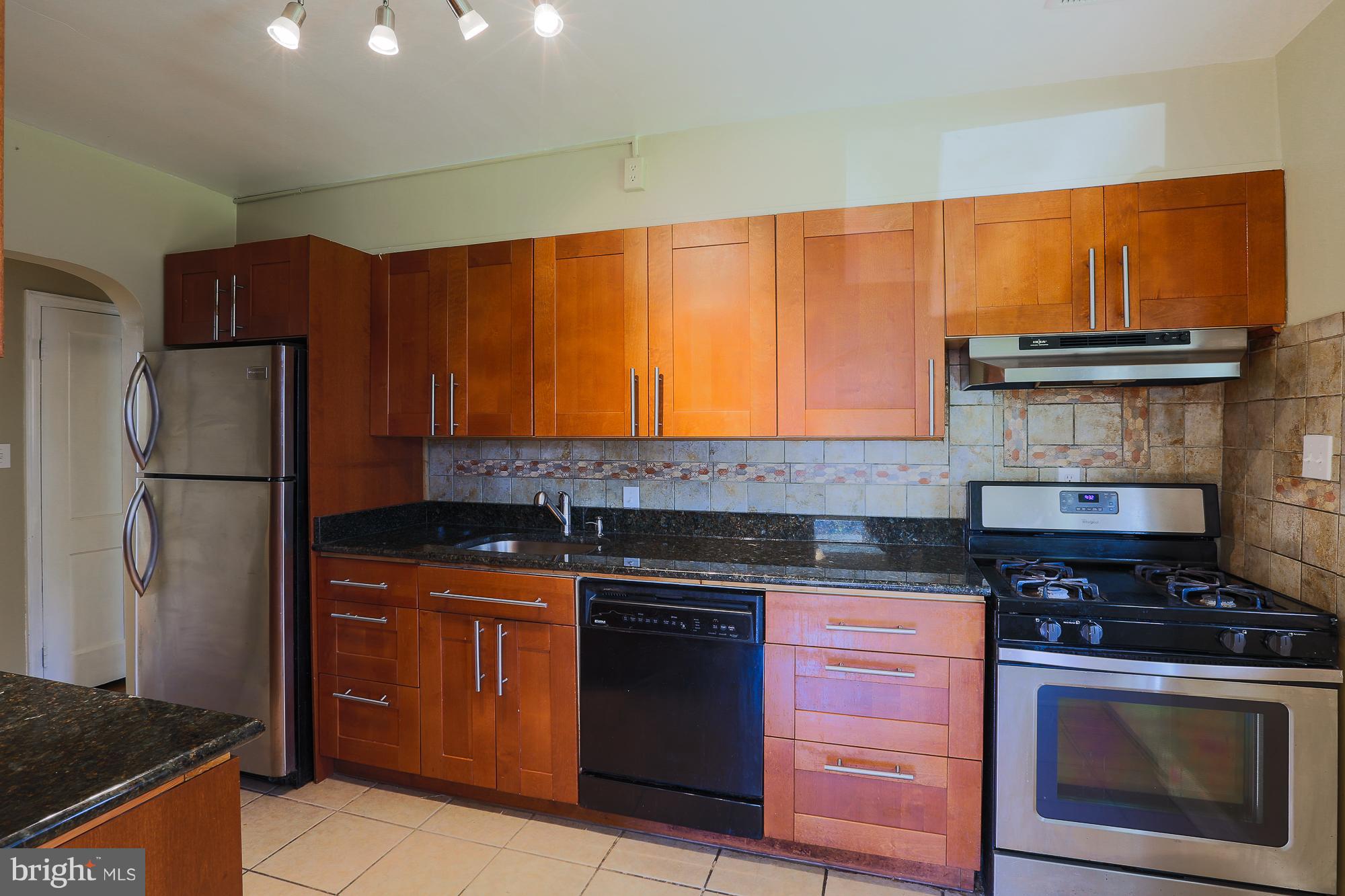 Updated Kitchen with wood cabinets