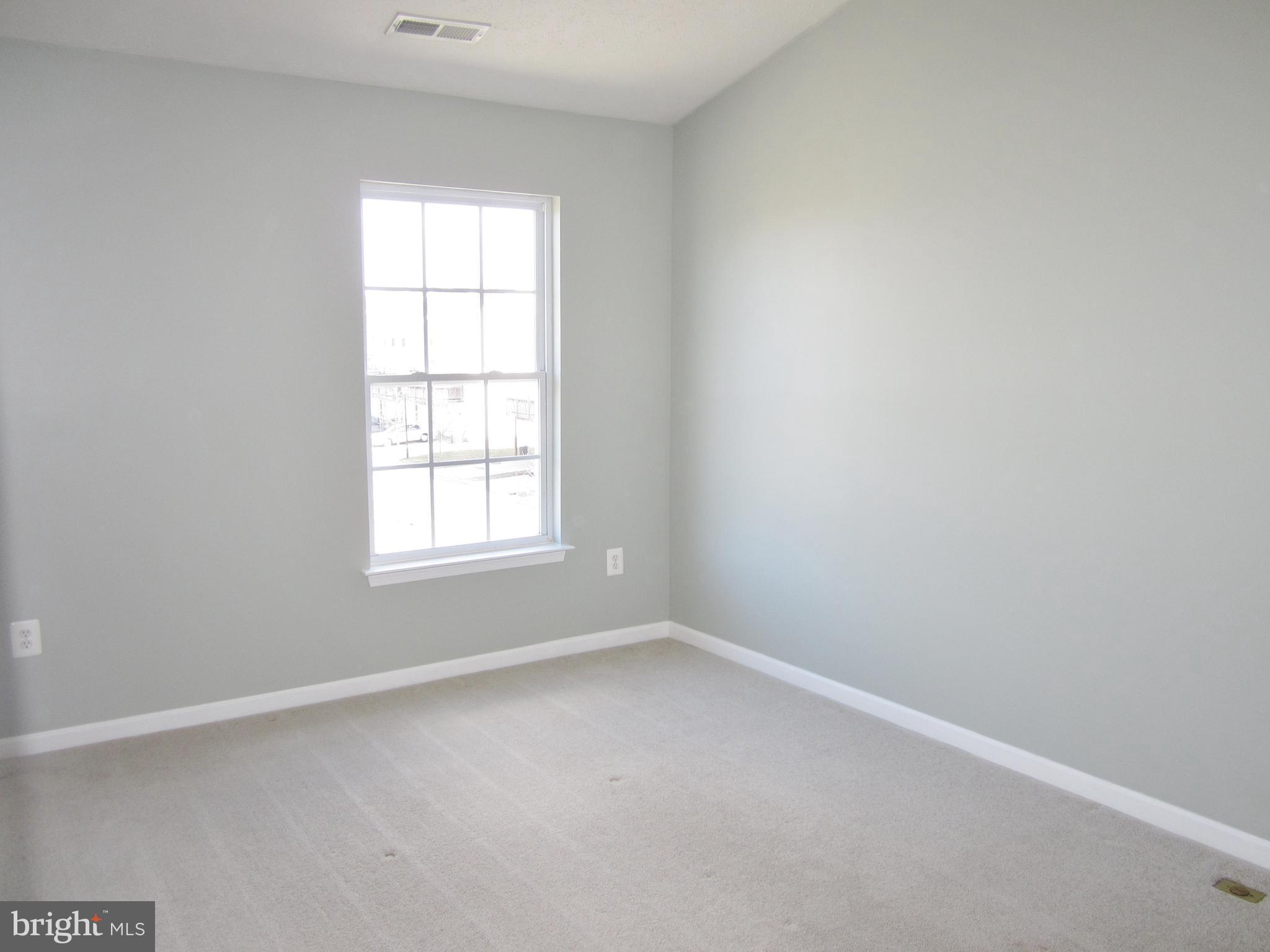 829 Lowe Road Baltimore, MD 21220 - Photo 17 of 28 an empty room with a window