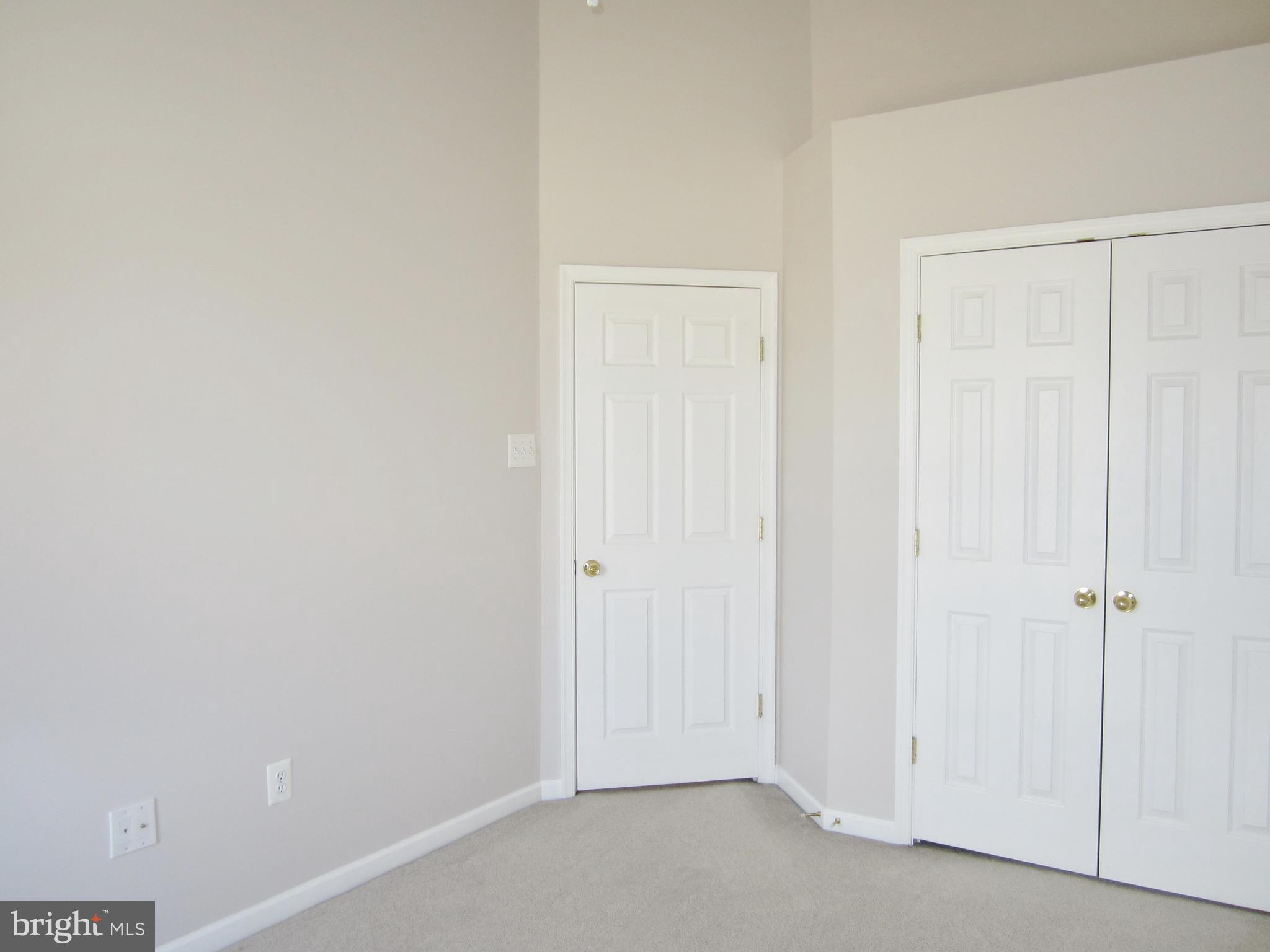 829 Lowe Road Baltimore, MD 21220 - Photo 21 of 28 an empty room with closet area
