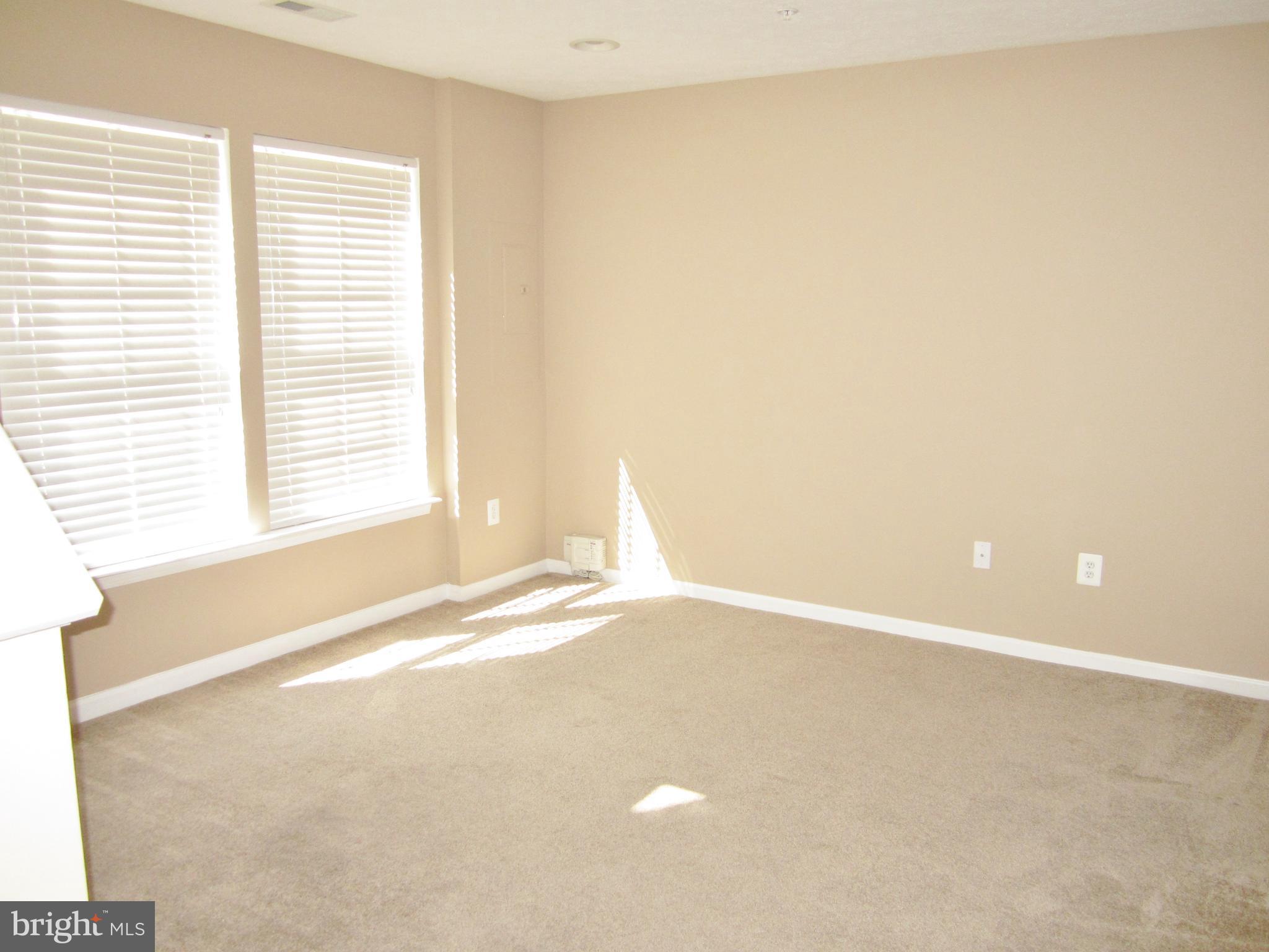 829 Lowe Road Baltimore, MD 21220 - Photo 23 of 28 a view of an empty room with a window