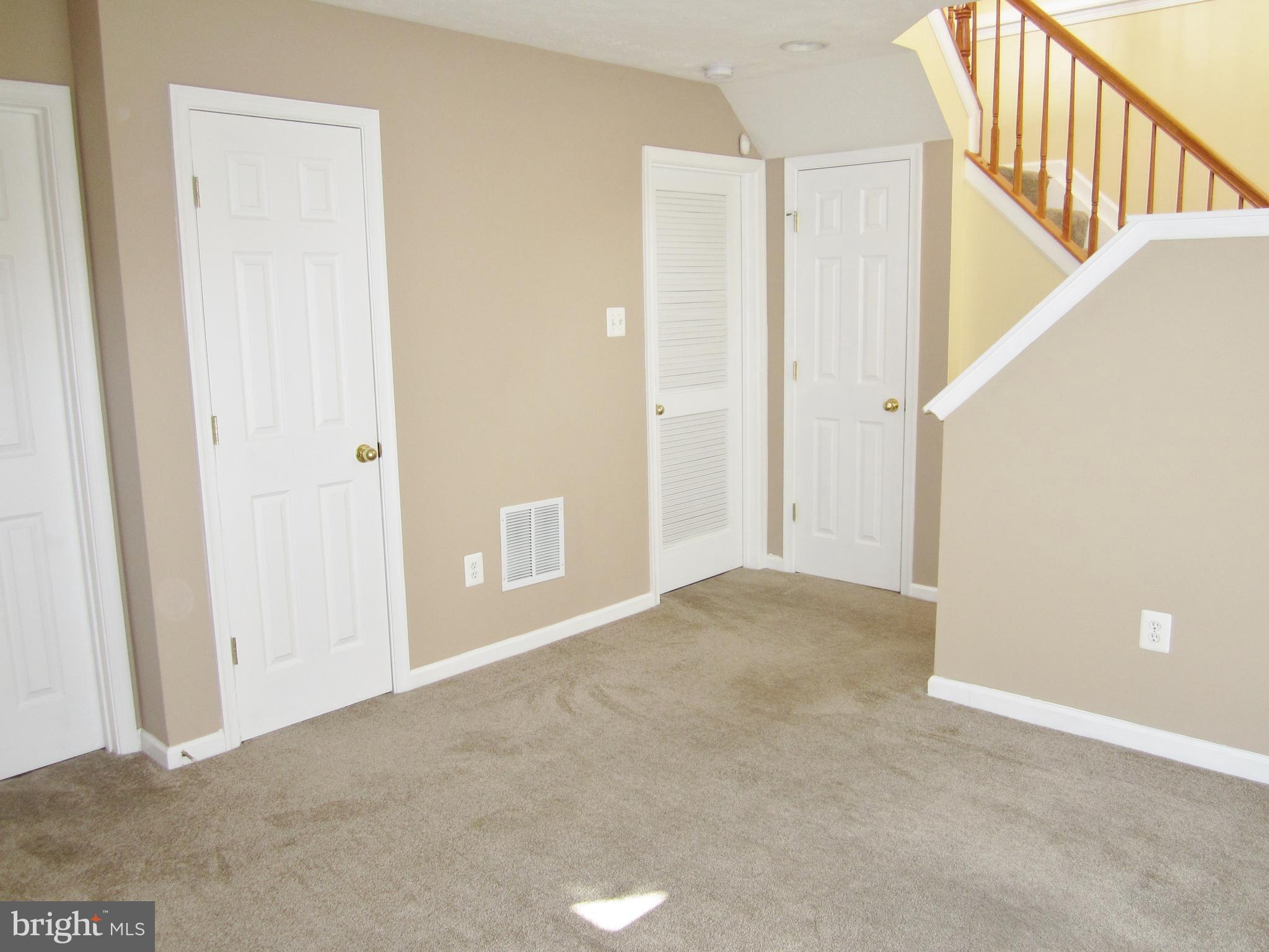 829 Lowe Road Baltimore, MD 21220 - Photo 25 of 28 a view of an entryway with staircase