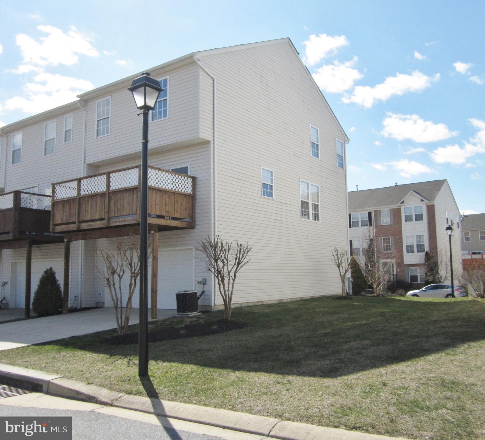 829 Lowe Road Baltimore, MD 21220 - Photo 28 of 28 a front view of a house with garden
