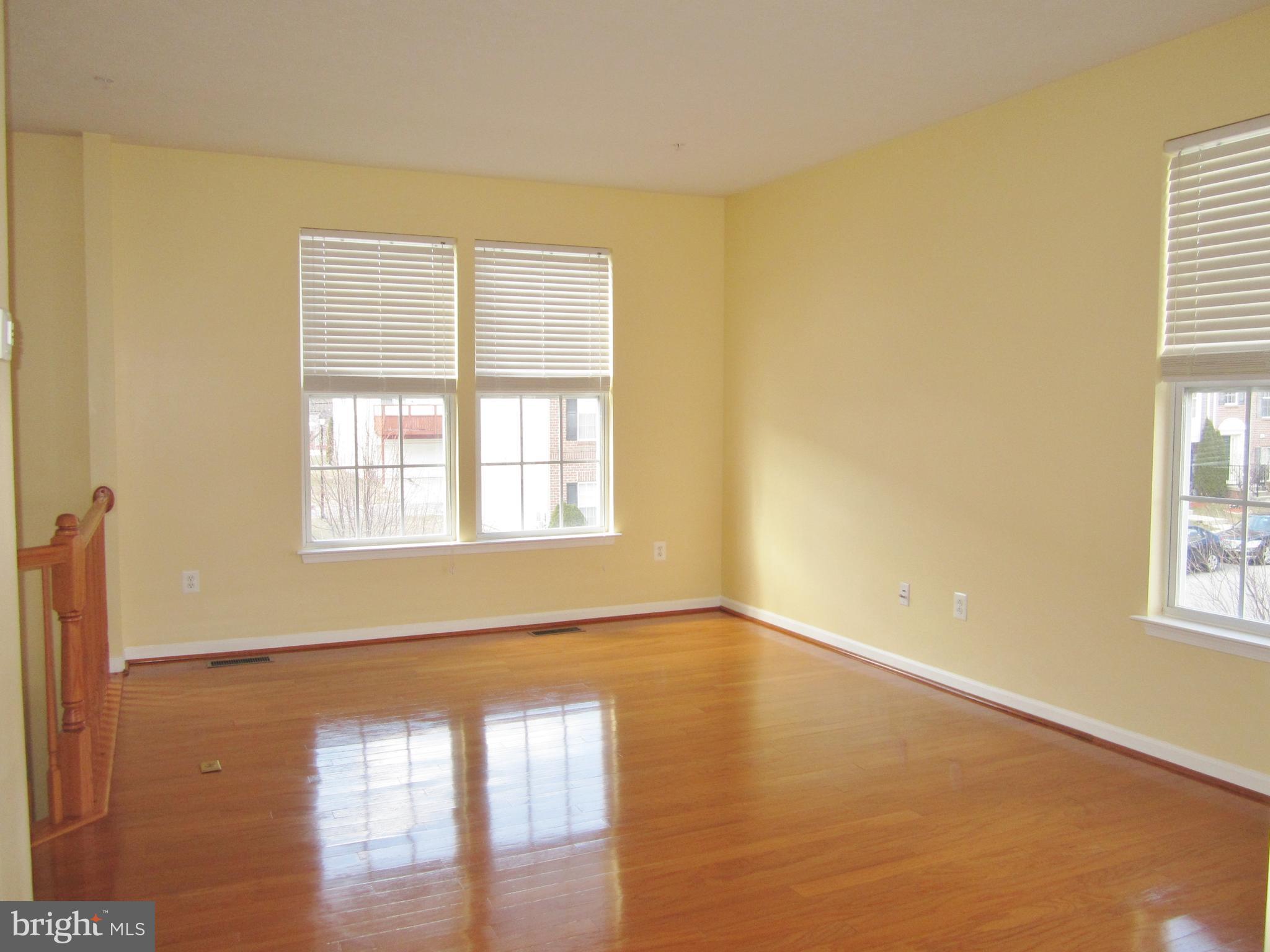 829 Lowe Road Baltimore, MD 21220 - Photo 6 of 28 a view of an empty room with a window
