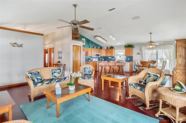 a living room with furniture and a table