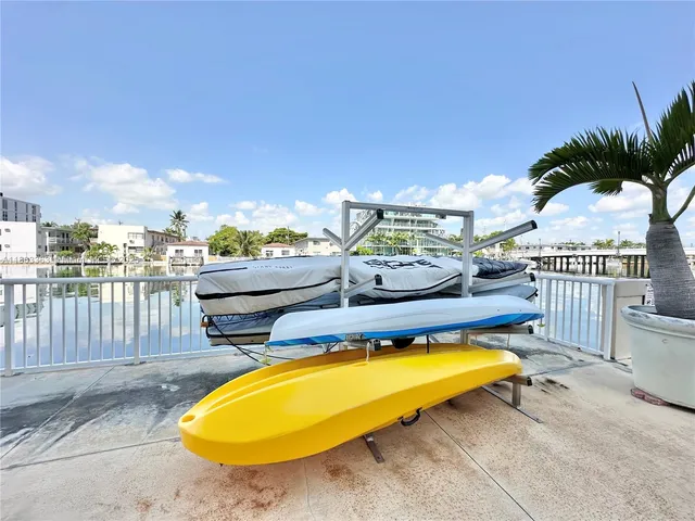 a view of residential buildings and lake
