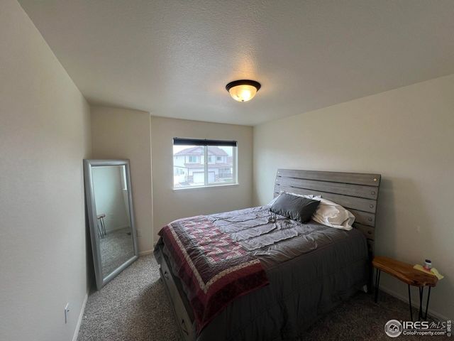 a living room with furniture and window
