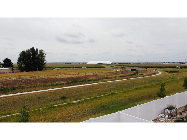 a view of an ocean and city