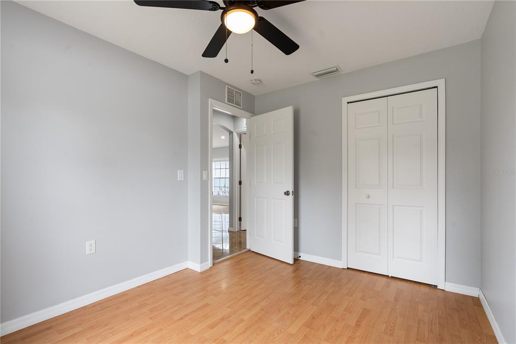 17168 Southwest 39th Circle Ocala, FL 34473 - Photo 22 of 36 a view of empty room with wooden floor