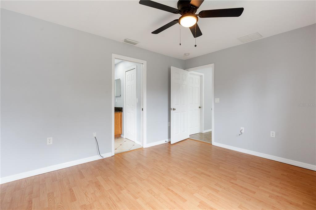 17168 Southwest 39th Circle Ocala, FL 34473 - Photo 26 of 36 wooden floor in an empty room