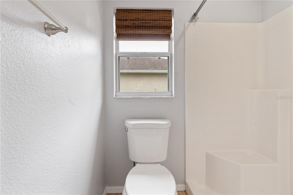 17168 Southwest 39th Circle Ocala, FL 34473 - Photo 28 of 36 a bathroom with a toilet