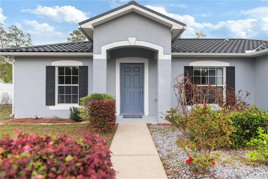 17168 Southwest 39th Circle Ocala, FL 34473 - Photo 3 of 36 a front view of a house