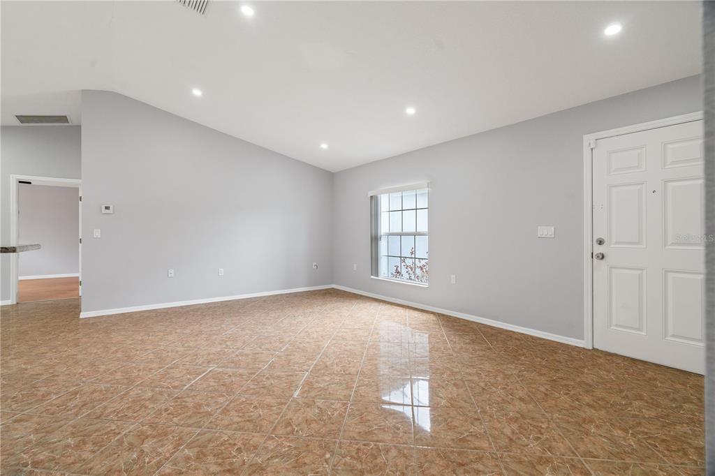 17168 Southwest 39th Circle Ocala, FL 34473 - Photo 9 of 36 a view of an empty room with a window