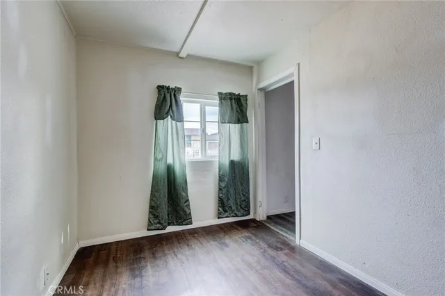 a kitchen with stainless steel appliances granite countertop a stove microwave and sink