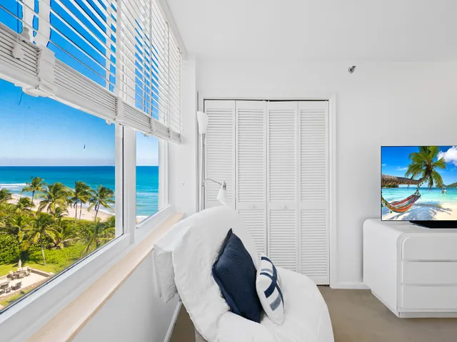 a living room with furniture and a gate