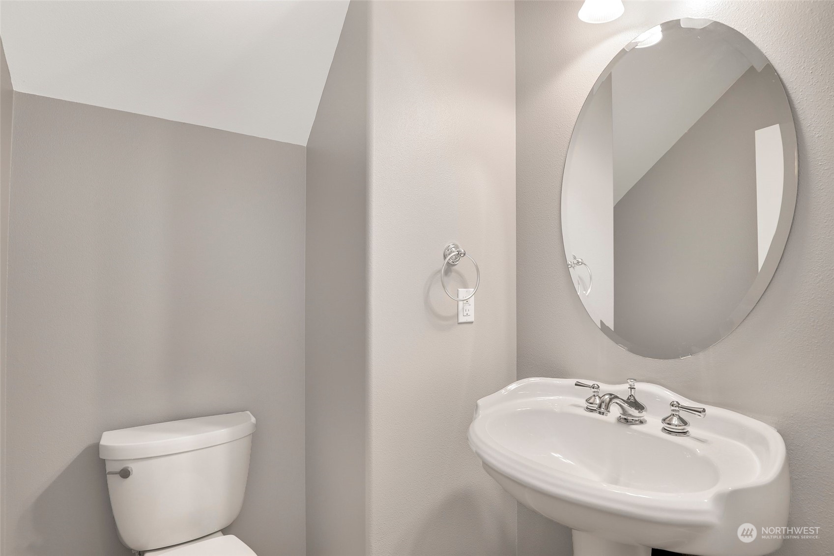 4633 181st Lane Southwest Rochester, WA 98579 - Photo 18 of 40 a bathroom with a toilet a sink and mirror