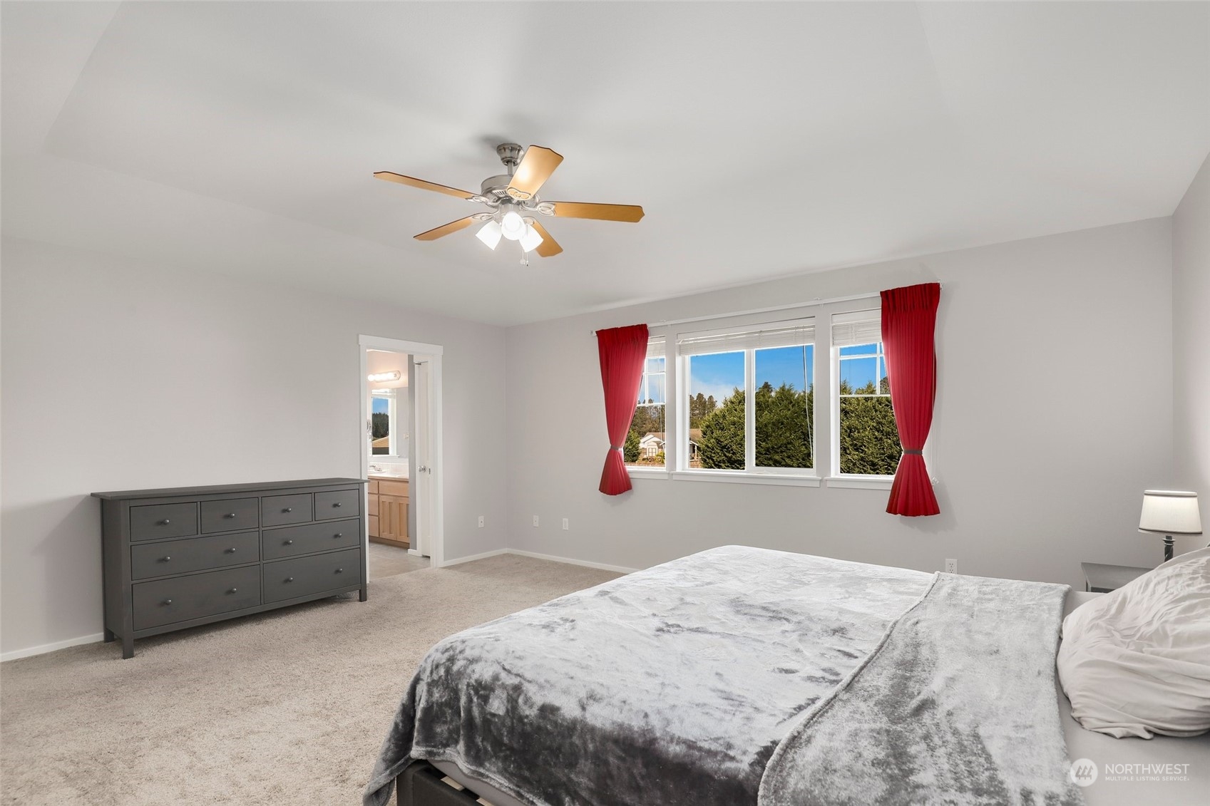 4633 181st Lane Southwest Rochester, WA 98579 - Photo 22 of 40 a bedroom with a bed and a window