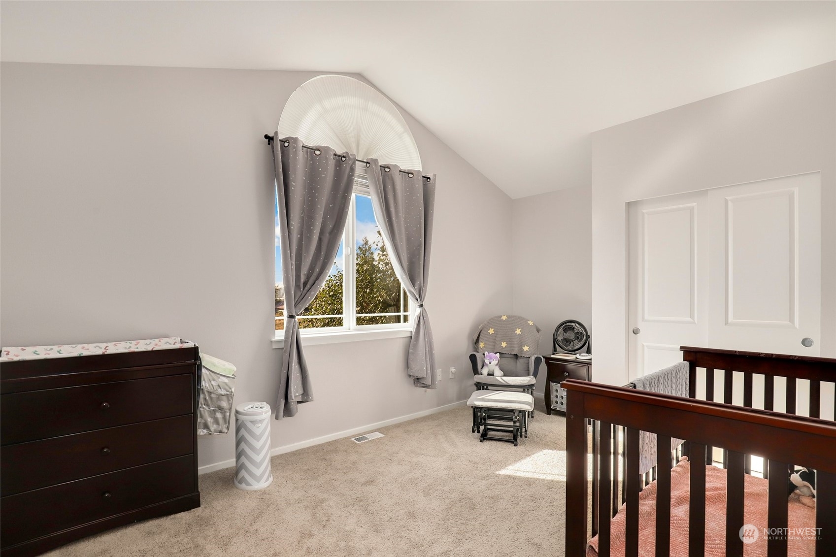 4633 181st Lane Southwest Rochester, WA 98579 - Photo 25 of 40 a bedroom with furniture and a window