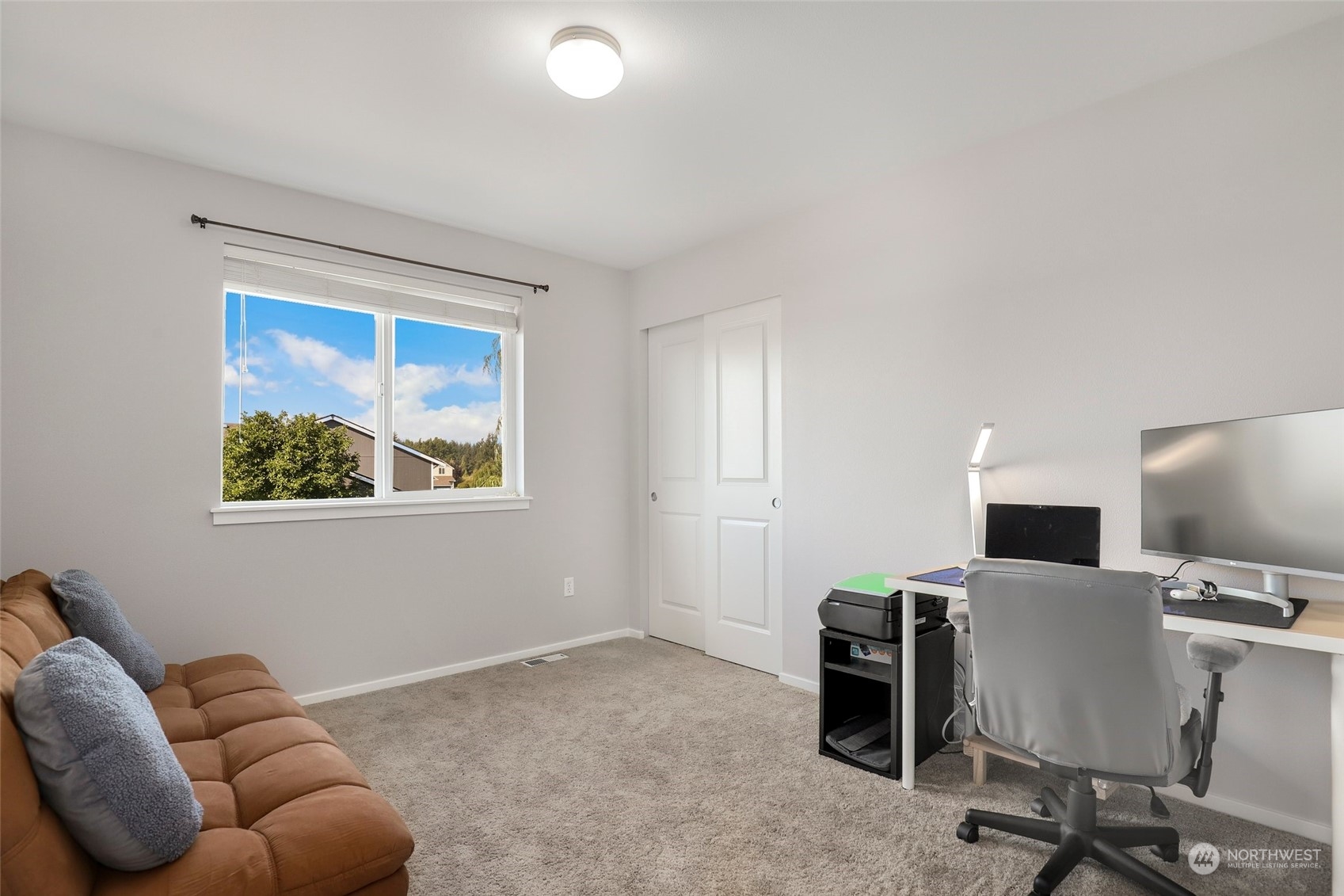 4633 181st Lane Southwest Rochester, WA 98579 - Photo 26 of 40 a livingroom with workspace and a window