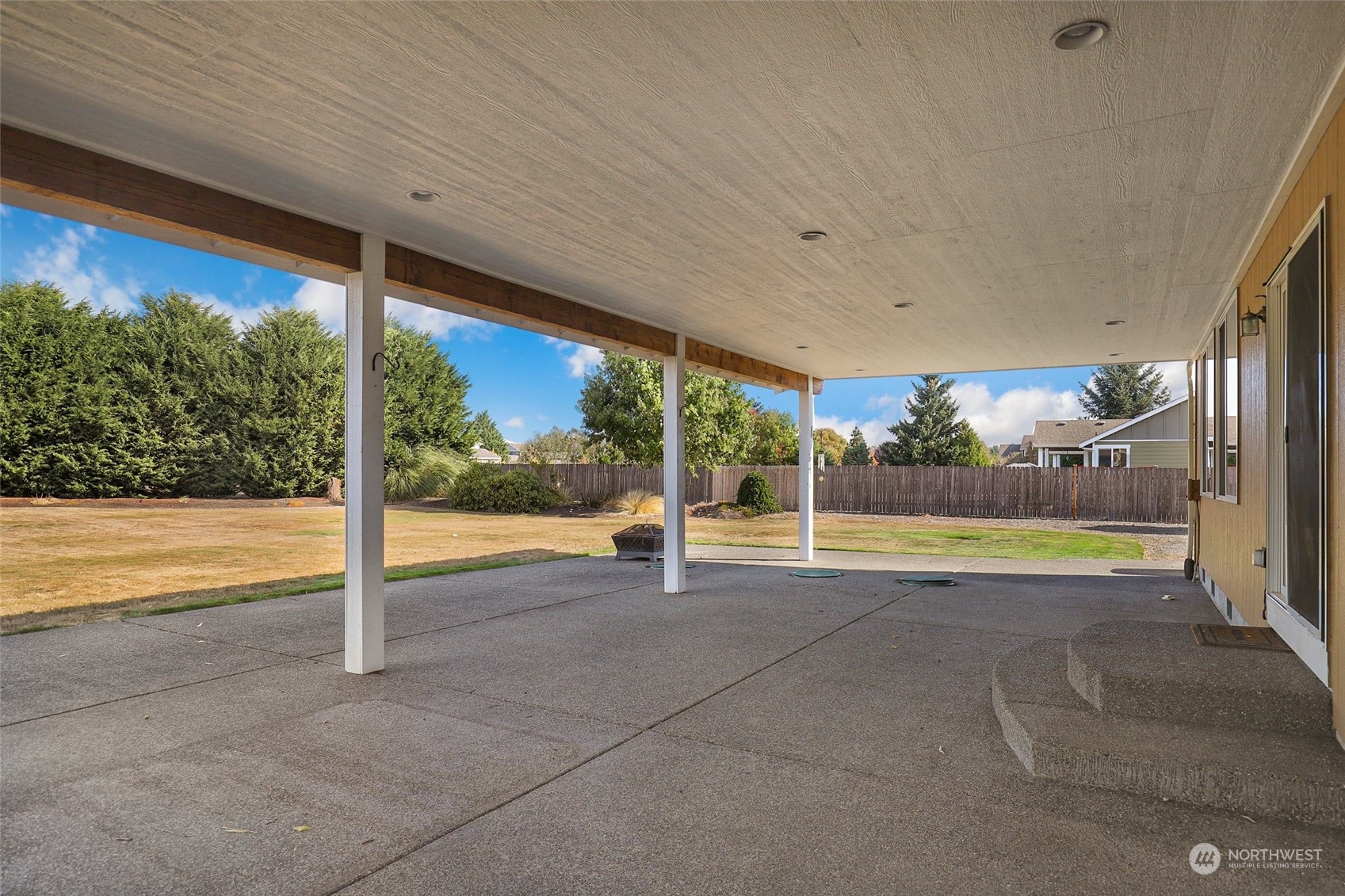 4633 181st Lane Southwest Rochester, WA 98579 - Photo 31 of 40 a view of a swimming pool with an outdoor seating