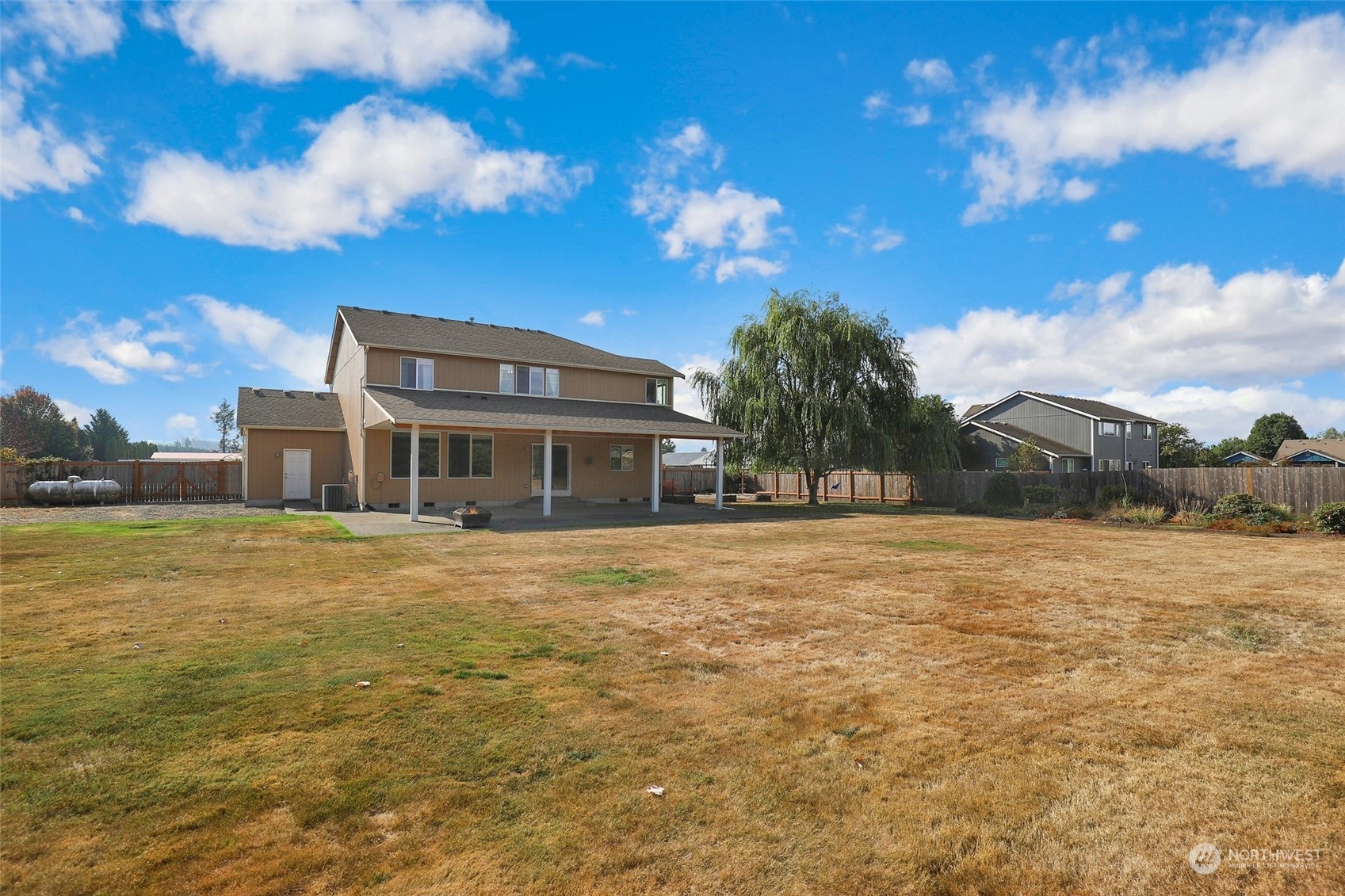 4633 181st Lane Southwest Rochester, WA 98579 - Photo 33 of 40 a front view of a house with a yard