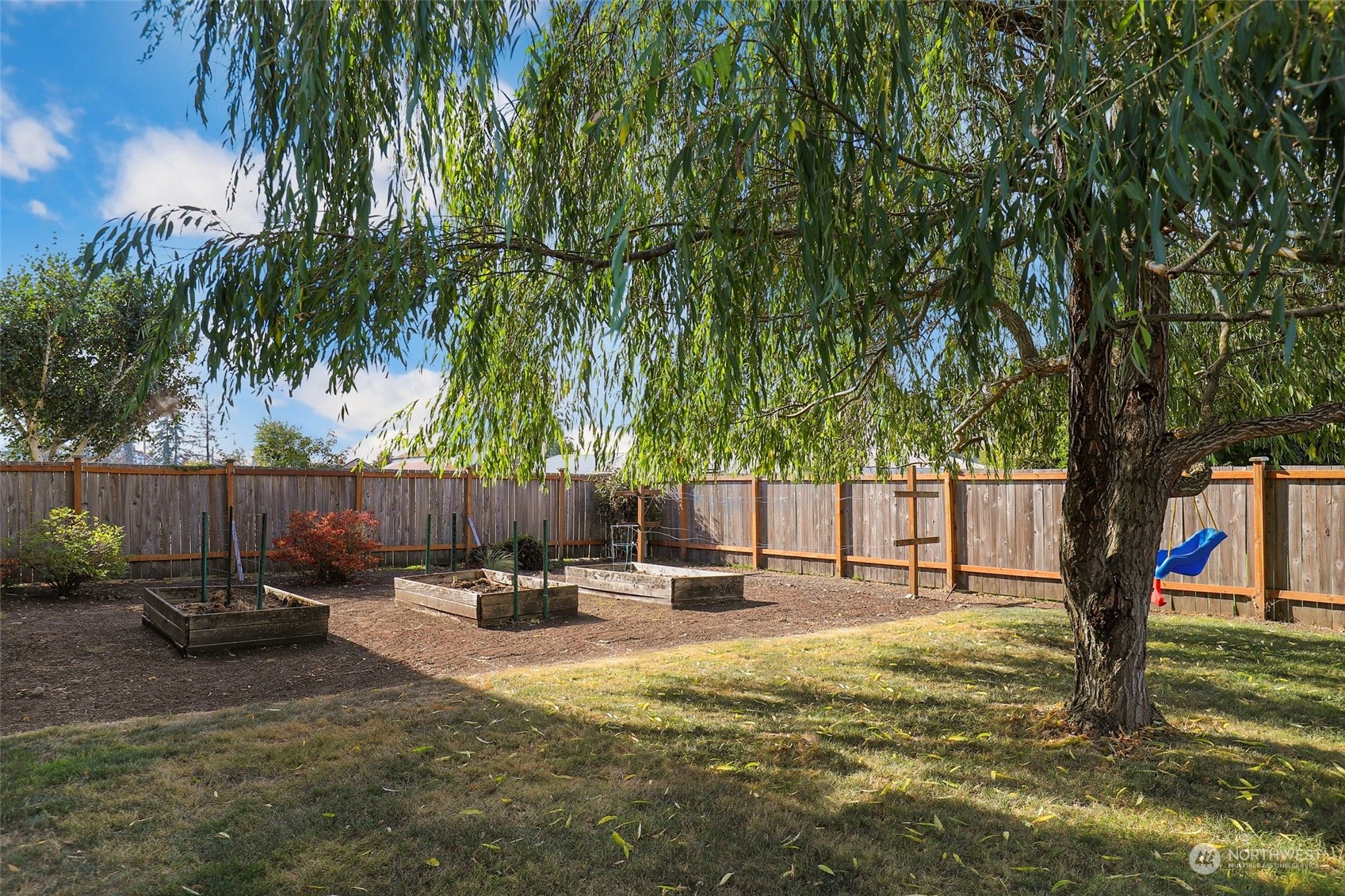 4633 181st Lane Southwest Rochester, WA 98579 - Photo 35 of 40 a swimming pool with outdoor seating and yard