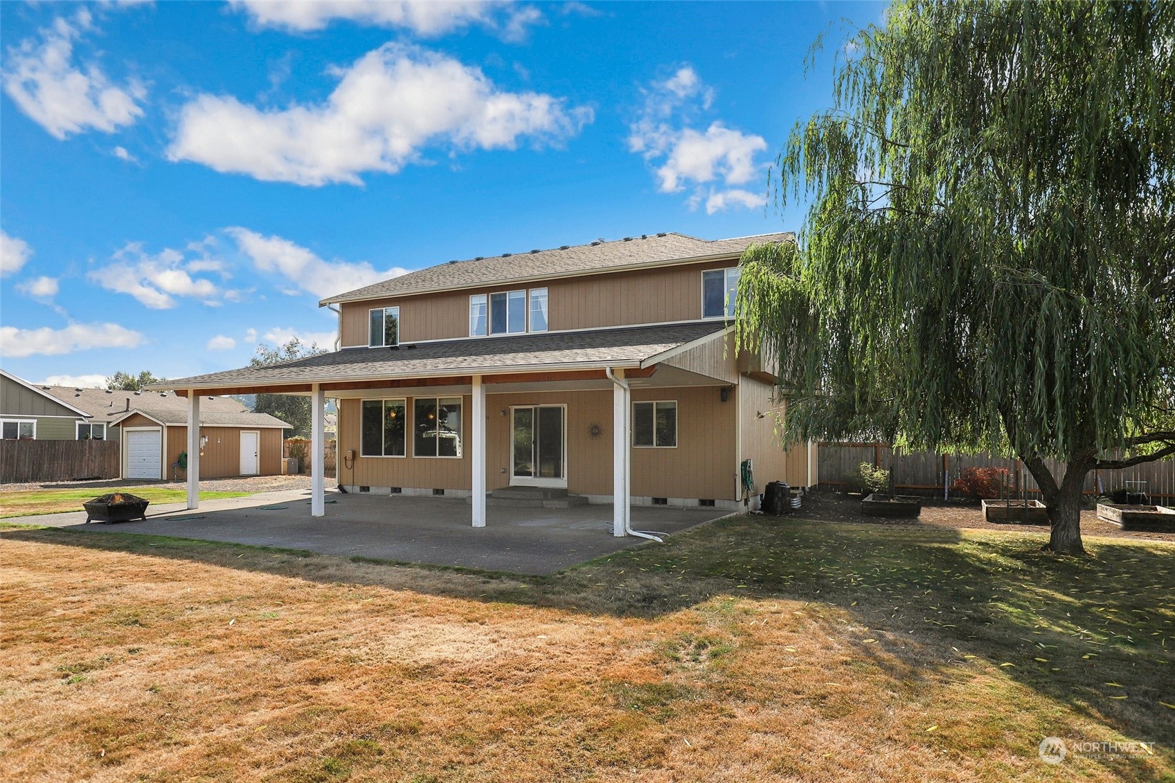 4633 181st Lane Southwest Rochester, WA 98579 - Photo 36 of 40 a front view of a house with a yard