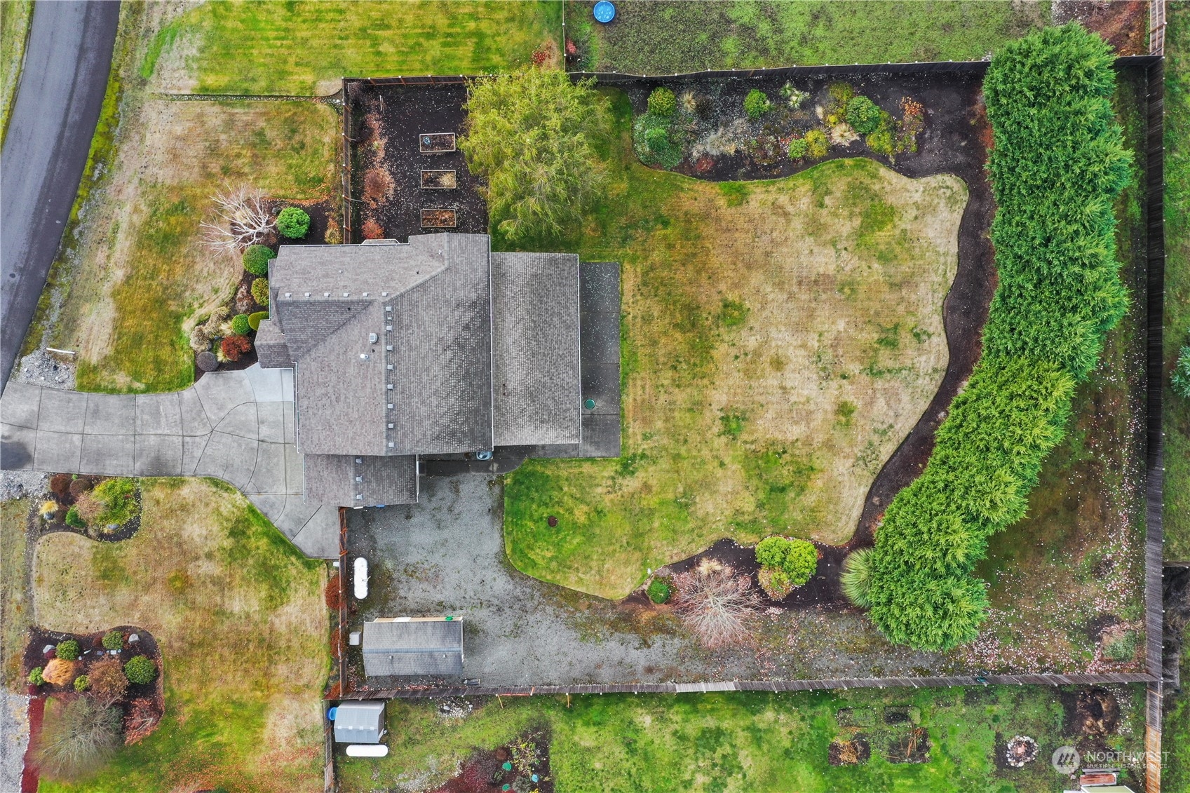 4633 181st Lane Southwest Rochester, WA 98579 - Photo 38 of 40 an aerial view of a house with a yard