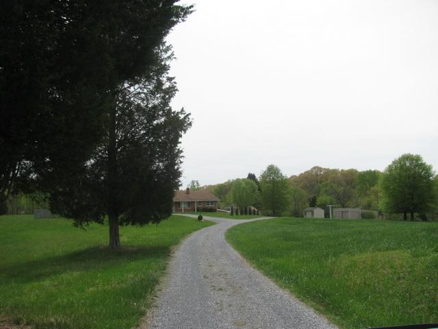 2668 Quarles Road Thaxton, VA 24174 - Photo 2 of 21 a view of a grassy field with trees