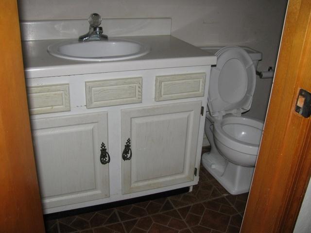 2668 Quarles Road Thaxton, VA 24174 - Photo 12 of 21 a bathroom with a toilet and a sink