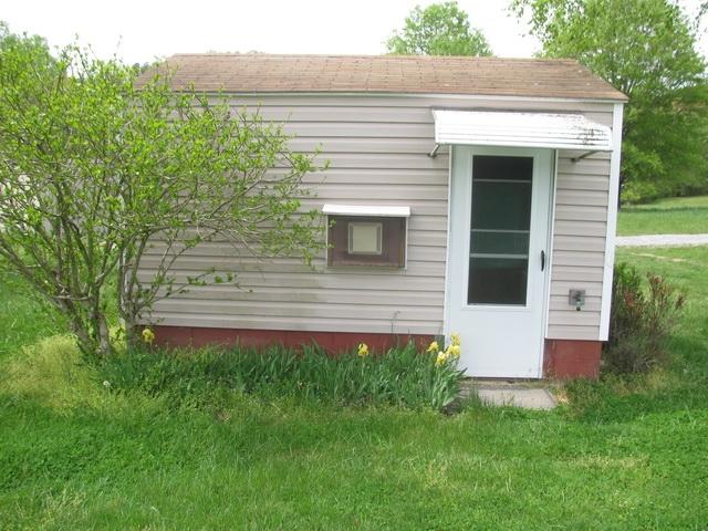 2668 Quarles Road Thaxton, VA 24174 - Photo 15 of 21 a view of front door of house and yard