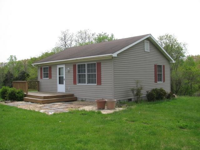 2668 Quarles Road Thaxton, VA 24174 - Photo 16 of 21 a view of front a house with a yard