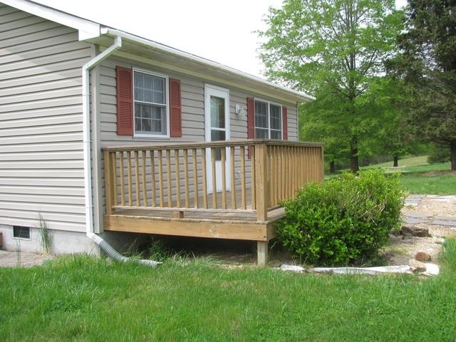 2668 Quarles Road Thaxton, VA 24174 - Photo 17 of 21 a view of backyard with a garden and plants