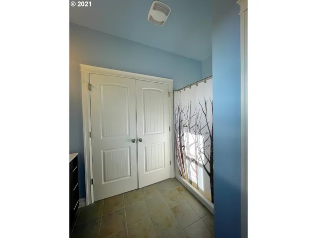 a view of a livingroom with a staircase