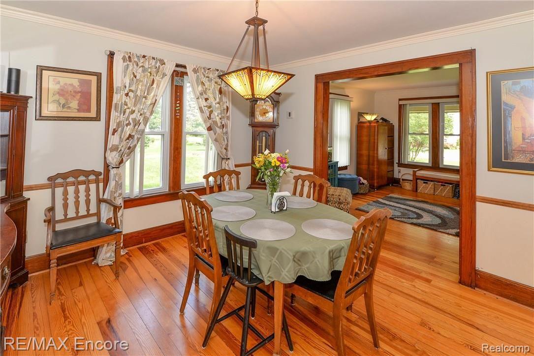 8354 Clinton River Road Sterling Heights, MI 48314 - Photo 19 of 62 Large dining room with beautiful trim and floors!