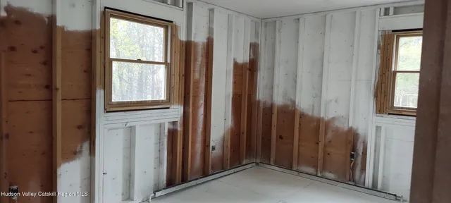 a kitchen with stainless steel appliances kitchen island granite countertop a stove and a sink