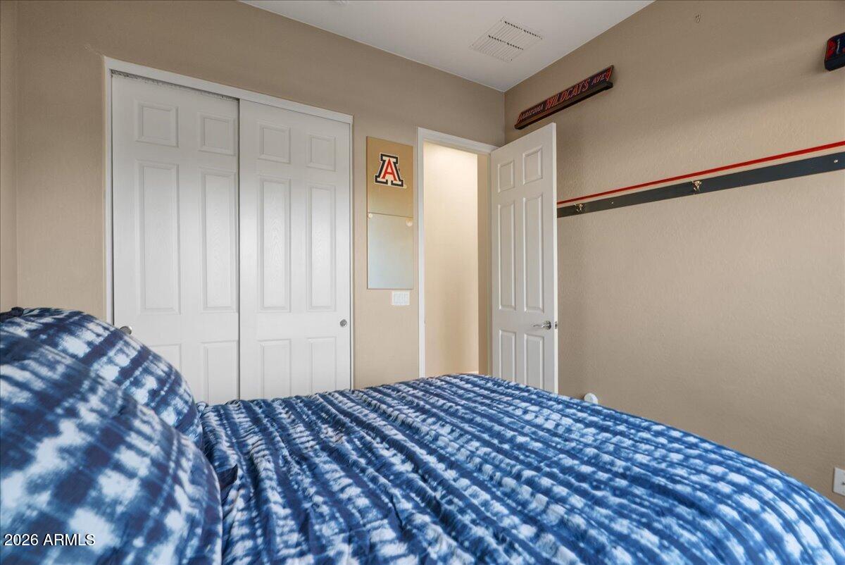 6427 South Magic Court Gilbert, AZ 85298 - Photo 37 of 71 a bedroom with a bed and a shower