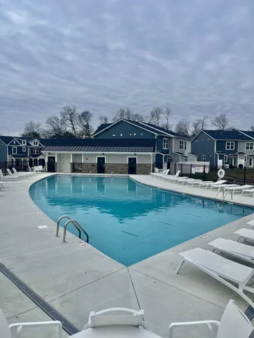 an aerial view of a house having yard