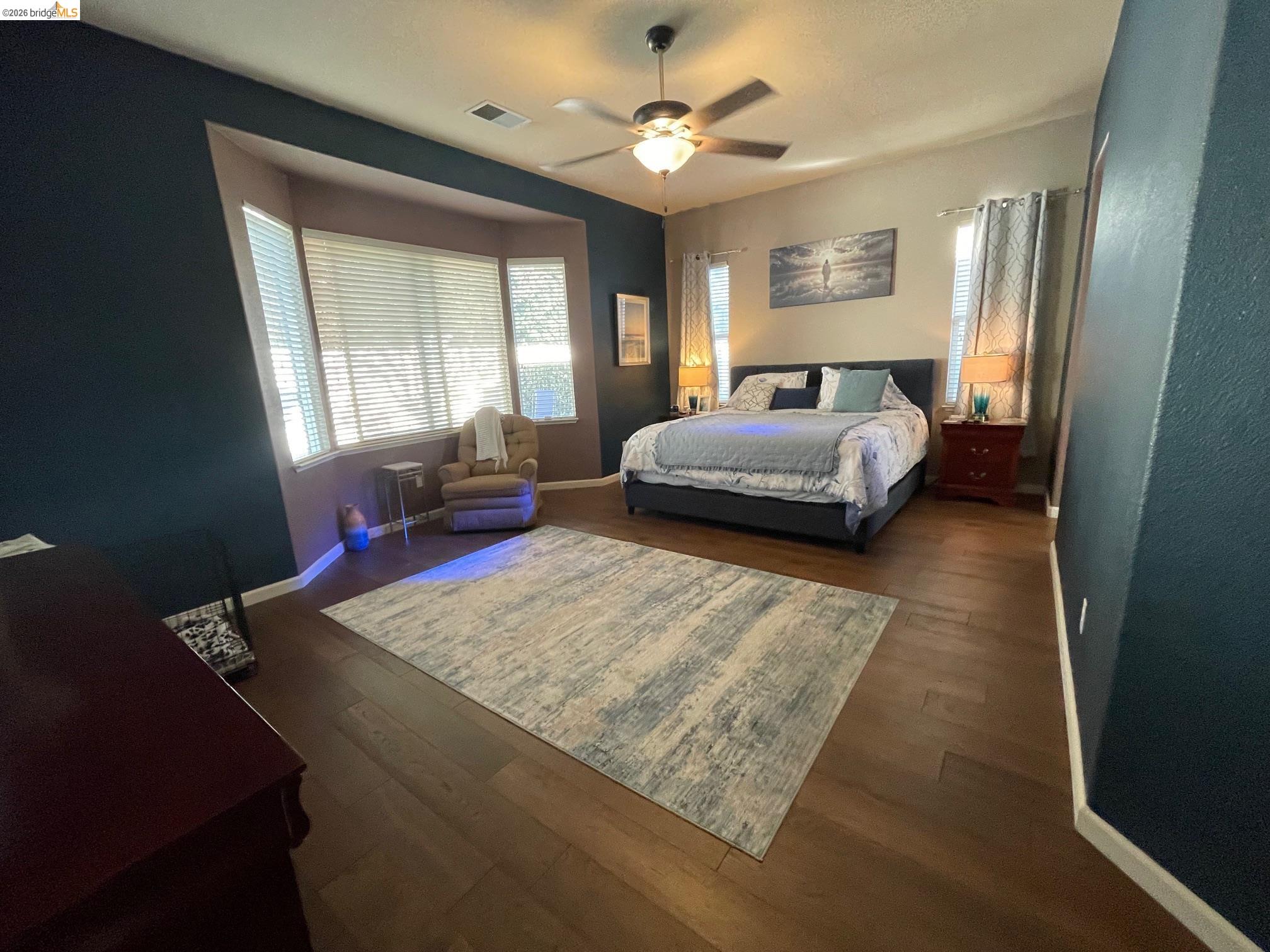 92 Liberty Lane Brentwood, CA 94513 - Photo 11 of 19 Bedroom featuring dark wood-style floors and a ceiling fan