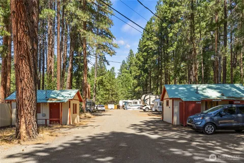a view of a car park in front of house