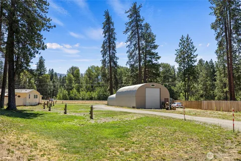 a view of a yard with an trees