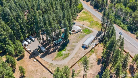 a kitchen with a refrigerator and a stove
