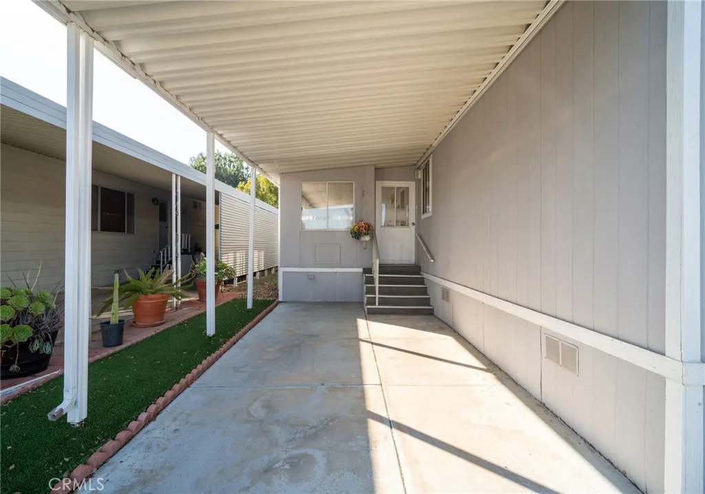 27701 Murrieta Road, Unit 37 Menifee, CA 92586 - Photo 22 of 24 a view of a porch